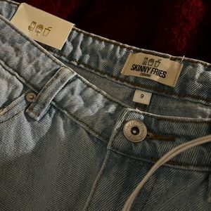 12 fits like a 9, never worn